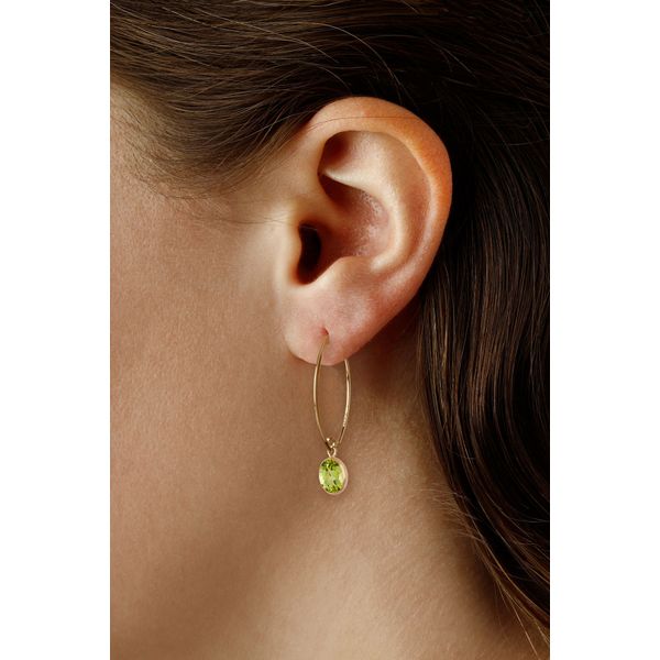 Simple Sweep Peridot Bezel Earrings Image 2 Blue Heron Jewelry Company Poulsbo, WA