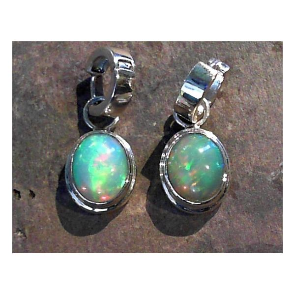 Sterling Silver Huggie Earrings with Oval Ethiopian Opals Bluestone Jewelry Tahoe City, CA