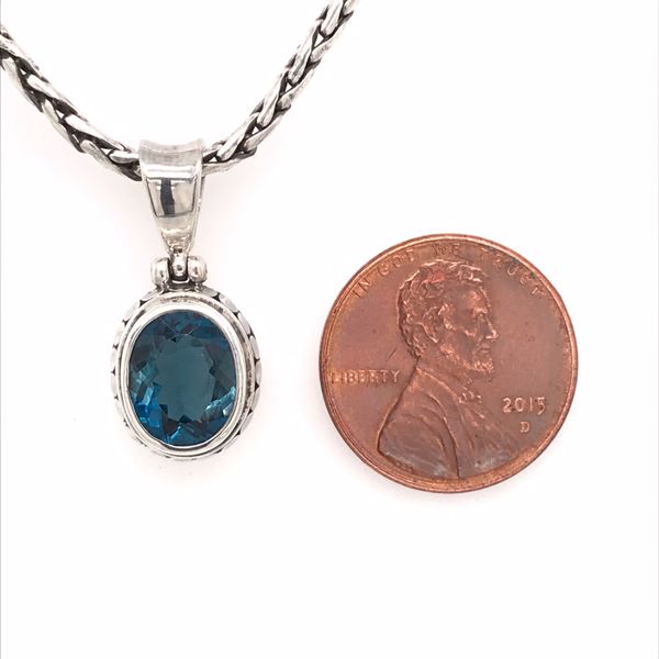 Sterling Silver Pendant with an Oval Cut London Blue Topaz gemstone. T Image 3 Bluestone Jewelry Tahoe City, CA