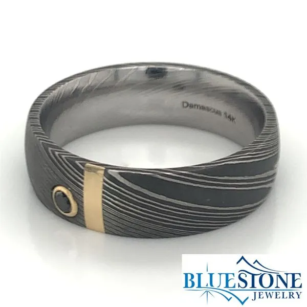 Damascus Steel 7mm Domed Band with a 2mm 14 Karat Yellow Gold Inlay and a 0.07 Carat Black Diamond. Image 3 Bluestone Jewelry Tahoe City, CA