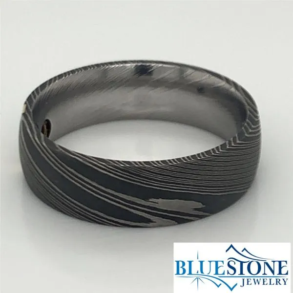 Damascus Steel 7mm Domed Band with a 2mm 14 Karat Yellow Gold Inlay and a 0.07 Carat Black Diamond. Image 4 Bluestone Jewelry Tahoe City, CA