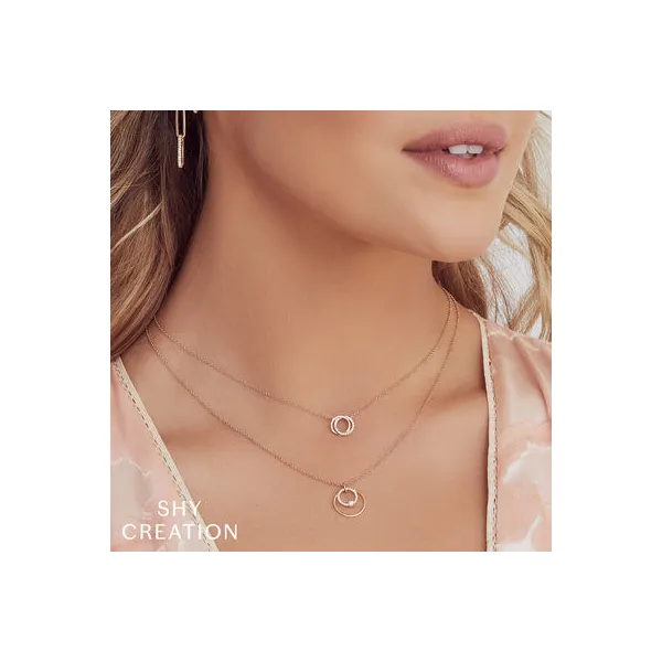 0.07 TCW LOVE KNOT DIAMOND PENDANT NECKLACE Image 2 Blue Water Jewelers Saint Augustine, FL