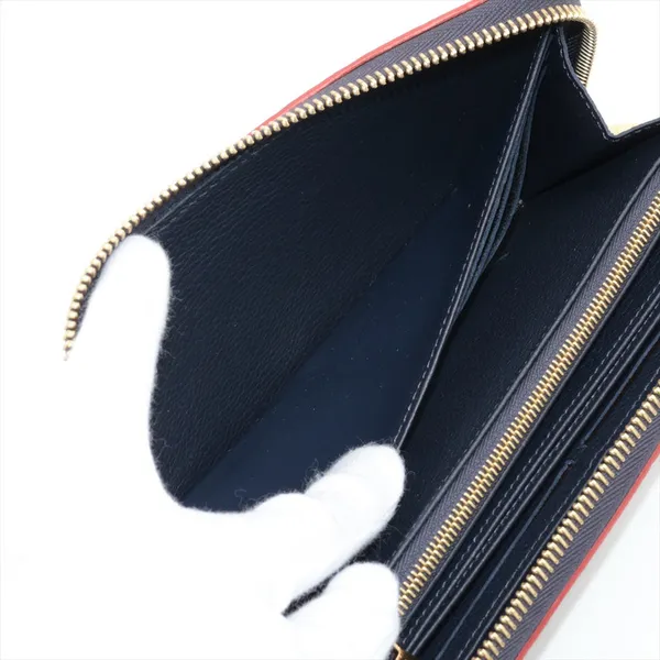 Louis Vuitton Empreinte Marine Rouge Zip Round Wallet Image 4 Blue Water Jewelers Saint Augustine, FL