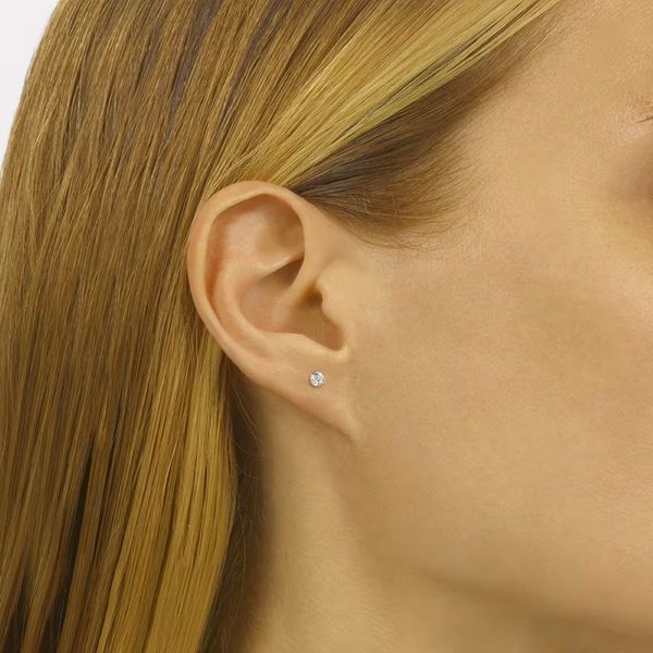 White 14 Karat .25 Ctw Diamond Stud Earrings | Classic Diamond Jewelry Image 2 Bradley's Jewelers Jacksonville, NC