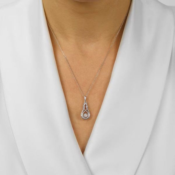 Lady's Sterling Silver .08 Ctw Diamond Rhythm Of Love Pendant Image 3 Bradley's Jewelers Jacksonville, NC