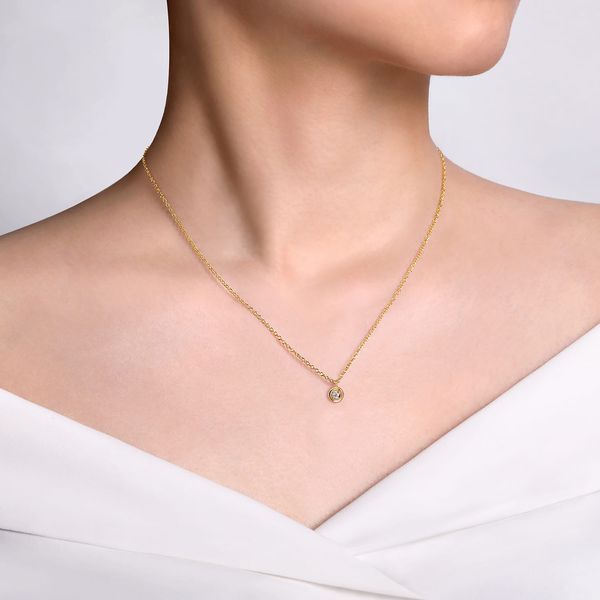 Gabriel & Co 14K Yellow Gold Round Diamond Pendant Necklace (0.03 CTW) | Contemporary Collection Image 3 Bradley's Jewelers Jacksonville, NC