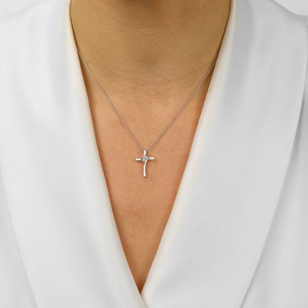 Sterling Silver .05 CTW Diamond TWOgether Cross Pendant Image 2 Bradley's Jewelers Jacksonville, NC