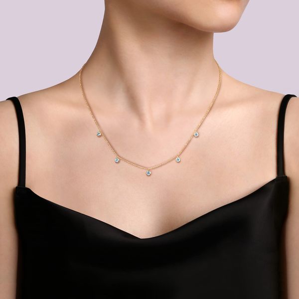 Gabriel & Co 14K White Gold Blue Topaz & Diamond Round Halo Pendant Image 3 Bradley's Jewelers Jacksonville, NC