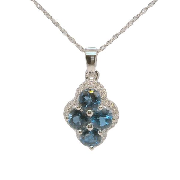Ladies 10K White Gold Blue Topaz Pendant | 0.13 CTW Diamond Accent Necklace Bradley's Jewelers Jacksonville, NC
