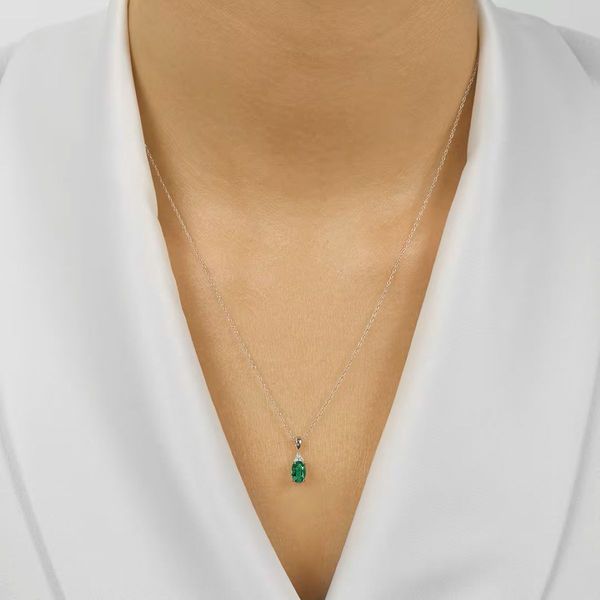 10K White Gold Oval Emerald & Diamond Drop Pendant – 0.50 CT Emerald Image 2 Bradley's Jewelers Jacksonville, NC
