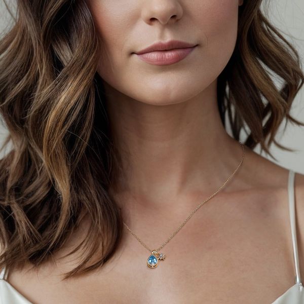 Gabriel & Co 14K Yellow Gold Blue Topaz & Diamond Drop Pendant – Lusso Color Collection Image 4 Bradley's Jewelers Jacksonville, NC