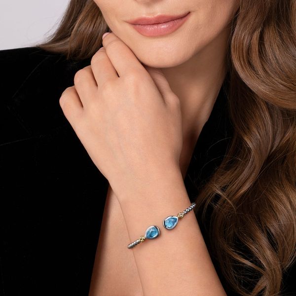 Gabriel & Co. 14K Yellow Gold & Sterling Silver Bujukan Pear Blue Topaz Bangle Image 4 Bradley's Jewelers Jacksonville, NC