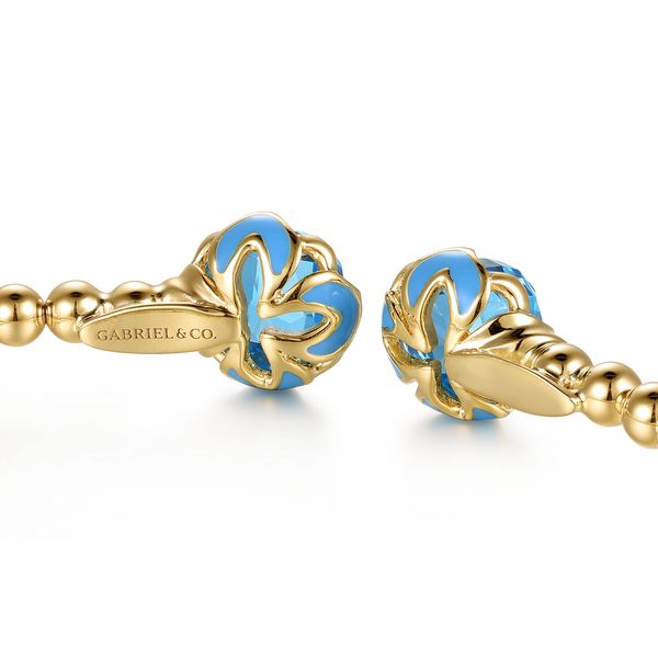 Gabriel & Co. 14K Yellow Gold Bujukan Swiss Blue Topaz Floral Split Bangle with Blue Enamel Image 4 Bradley's Jewelers Jacksonville, NC