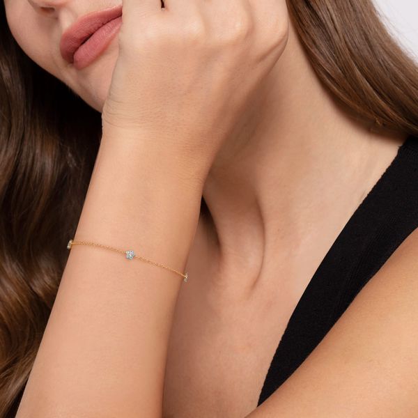 Gabriel & Co. 14K Yellow Gold Blue Topaz & Diamond Floral Station Bracelet Image 3 Bradley's Jewelers Jacksonville, NC