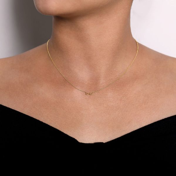 Gabriel & Co 14K Yellow Gold Infinity Pendant – Contemporary Collection Image 3 Bradley's Jewelers Jacksonville, NC
