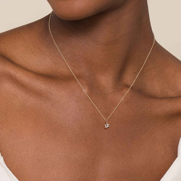 Gabriel & Co. Contemporary 14K Yellow Gold Star of David Pendant Necklace with 0.03 CTW Diamonds Image 3 Bradley's Jewelers Jacksonville, NC