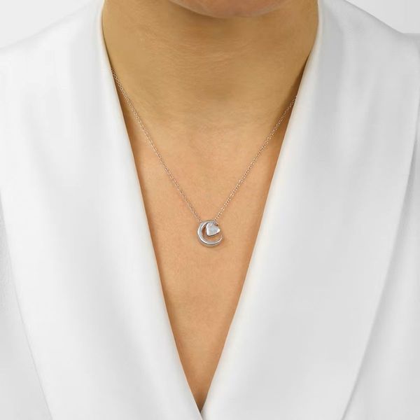 Sterling Silver .01 CT Diamond Heart and Crescent Moon Pendant Necklace Image 2 Bradley's Jewelers Jacksonville, NC
