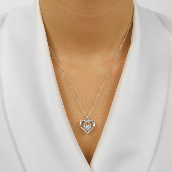Sterling Silver Created Aquamarine Heart Rhythm of Love Pendant Image 2 Bradley's Jewelers Jacksonville, NC