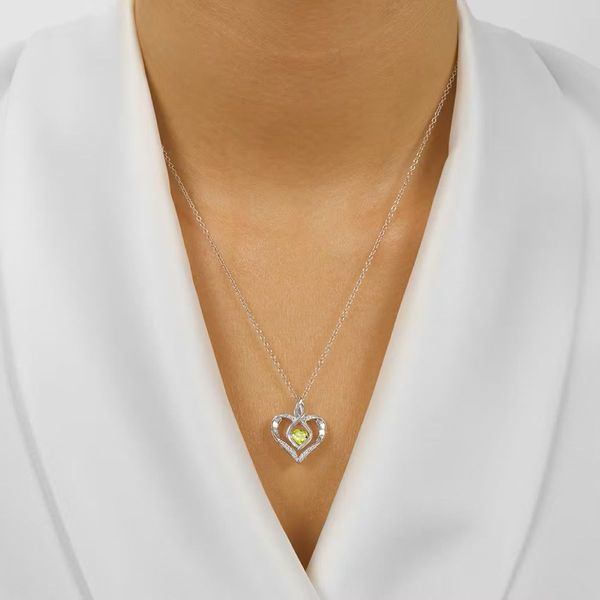 White Sterling Silver Rhythm of Love Heart Pendant with Peridot Image 2 Bradley's Jewelers Jacksonville, NC