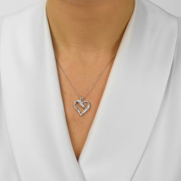 Sterling Silver .02 CTW Diamond Heart Pendant Image 2 Bradley's Jewelers Jacksonville, NC