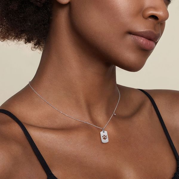 Gabriel & Co. Bujukan Sterling Silver Dog Tag Paw Print Pendant Necklace Image 3 Bradley's Jewelers Jacksonville, NC