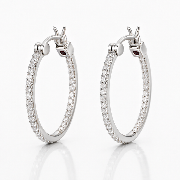 ELLE Rodeo Drive Rhodium Plated CZ Oval Hoop Earrings | 24x20MM Bradley's Jewelers Jacksonville, NC