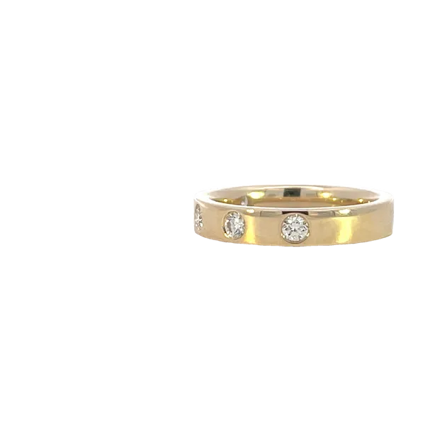 4mm Flat high polished 14k yellow band with five (5) Gypsy set Round diamonds Image 2 Bryan Jewelry Prattville, AL