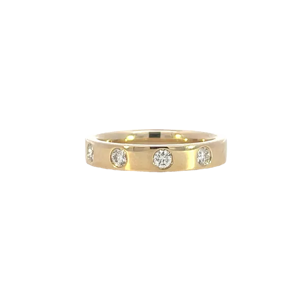 4mm Flat high polished 14k yellow band with five (5) Gypsy set Round diamonds Bryan Jewelry Prattville, AL