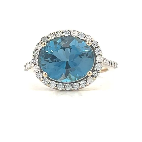 Blue Topaz with miracle plate halo and shank Bryan Jewelry Prattville, AL