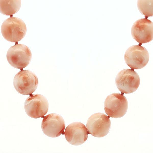 An 11mm coral bead necklace in a 20 inch length Bryan Jewelry Prattville, AL