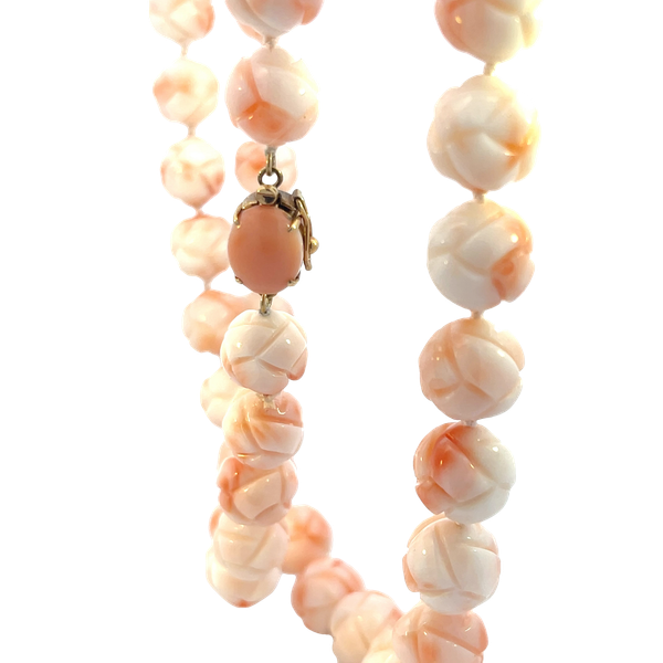 A strand of carved endless knot coral beads-14ky clasp Image 4 Bryan Jewelry Prattville, AL