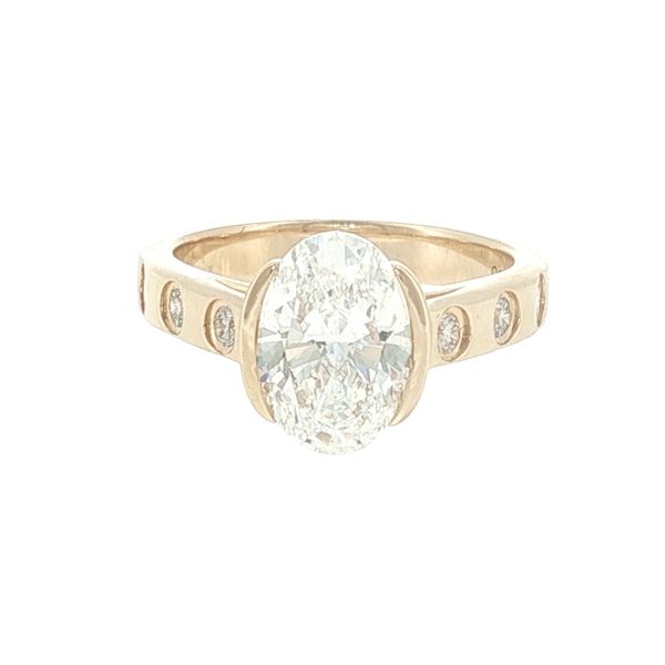 Modern Elegance: Oval Diamond Half-Bezel Cathedral Ring Bryan Jewelry Prattville, AL