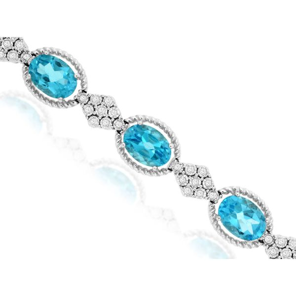 Blue Topazs & Diamonds Rope Halo cluster Bracelet in 14 Karat Carroll / Ochs Jewelers Monroe, MI