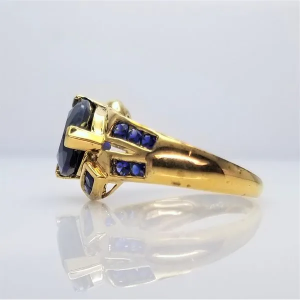 Yellow-Tone Sterling Silver Trillion and Round Cut Synthetic Sapphire Ring Image 2 Chipper's Jewelry Bonney Lake, WA