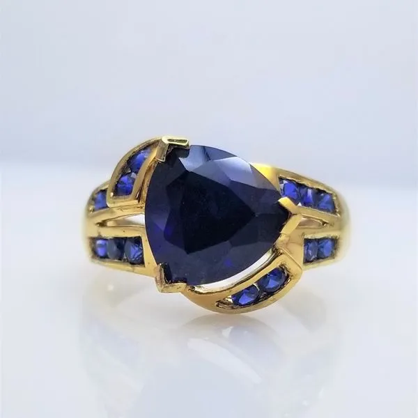 Yellow-Tone Sterling Silver Trillion and Round Cut Synthetic Sapphire Ring Chipper's Jewelry Bonney Lake, WA