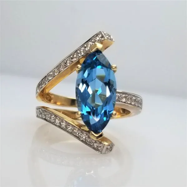 Marquise Cut Blue Topaz and White Topaz Ring in 14kt Yellow Gold Chipper's Jewelry Bonney Lake, WA