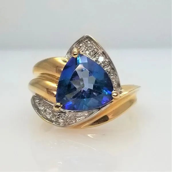 Trillion Cut Ocean Blue Topaz and Diamond Ring in 14K Yellow Gold Chipper's Jewelry Bonney Lake, WA