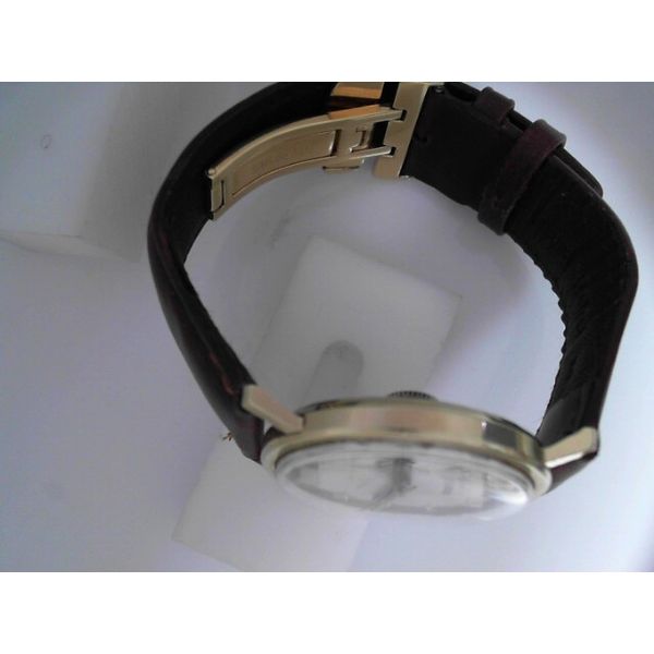 14KY 1968-1969 Timex Dorado Electric Wristwatch with Leather Band. Chipper's Jewelry Bonney Lake, WA