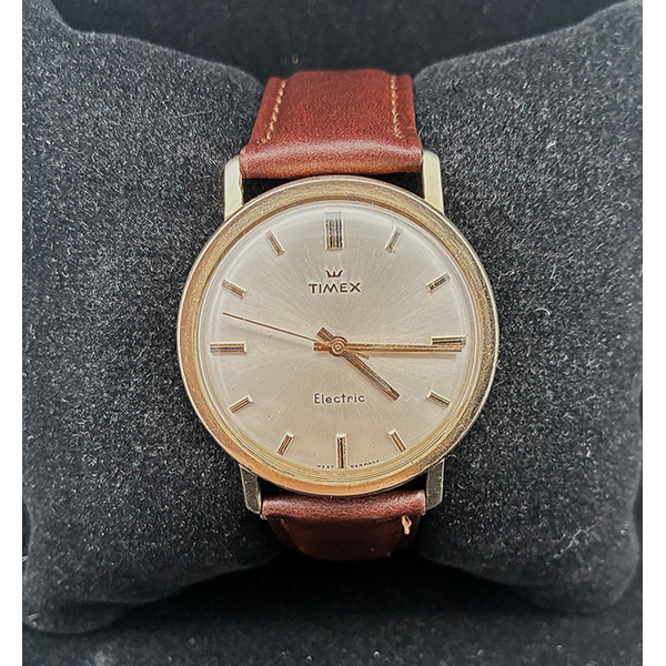 14KY 1968-1969 Timex Dorado Electric Wristwatch with Leather Band. Chipper's Jewelry Bonney Lake, WA