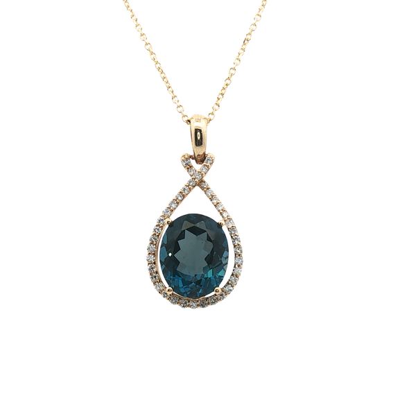 London Blue Topaz Oval Halo Pendant in 14kt Yellow Gold Clark's Diamond Jewelers Coeur d'Alene, ID