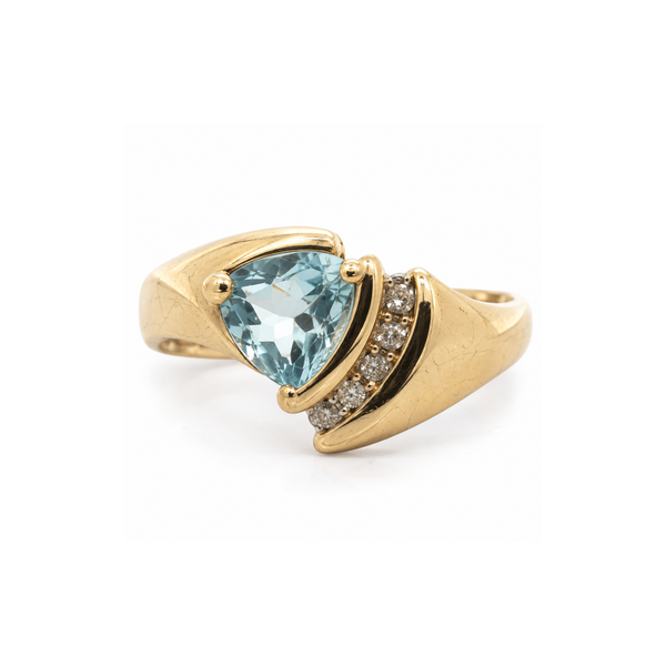Pre-Owned 14K Yellow Gold Blue Topaz and Channel Set Round Brilliant Diamond Ring .07ct TW Classic Creations In Diamonds & Gold Venice, FL