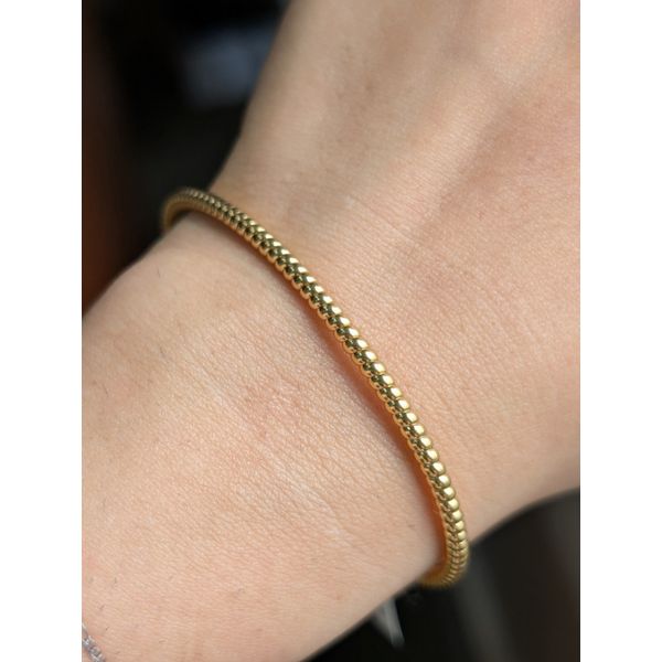 Vermeil Polished Twisted Bangle Bracelet in Sterling Silver Yellow Gold Image 4 Conti Jewelers Endwell, NY