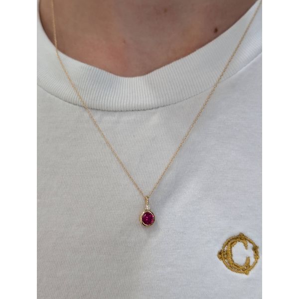 1/20th Ct. Diamond and Lab-Grown Ruby Birthstone Necklace in 10k Yellow Gold Image 2 Conti Jewelers Endwell, NY