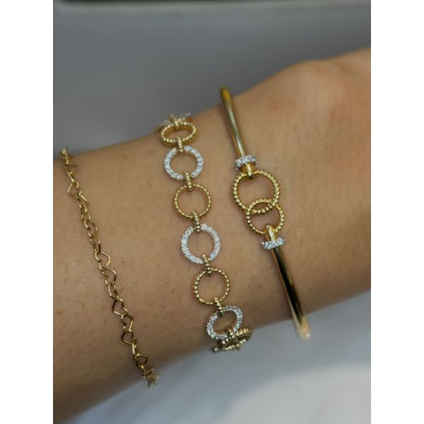 0.07cttw. Diamond Bangle in 14k Yellow Gold Image 2 Conti Jewelers Endwell, NY