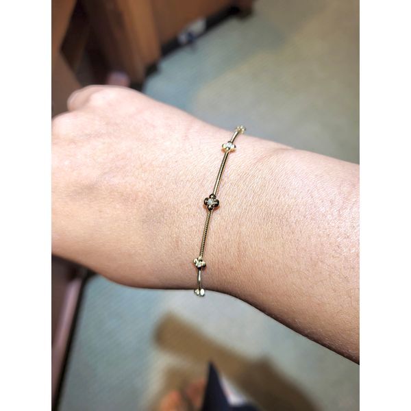 .05 Ctw. Diamond Flower Flexie Bangle in 14k Yellow Gold Image 2 Conti Jewelers Endwell, NY
