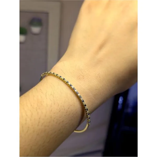 1/2cttw. Diamond  and Blue Sapphire Flexi Bangle in 14k Yellow Gold Image 2 Conti Jewelers Endwell, NY
