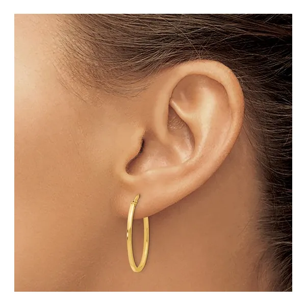 Polished Oval Hoop Earrings in 14K Yellow Gold Image 2 Conti Jewelers Endwell, NY
