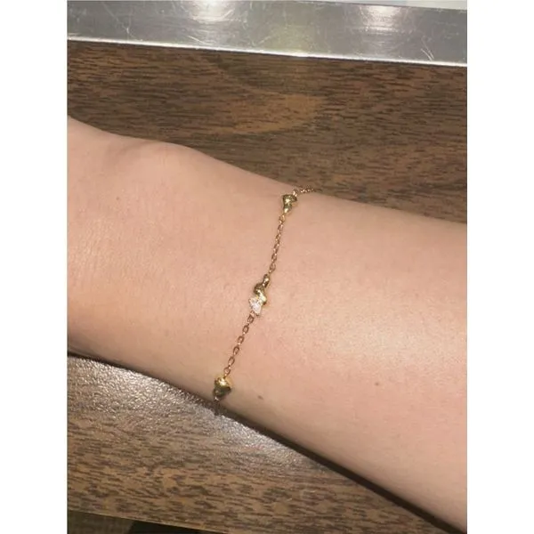 Twisted Wave Chain Bracelet in Yellow Gold Image 2 Conti Jewelers Endwell, NY