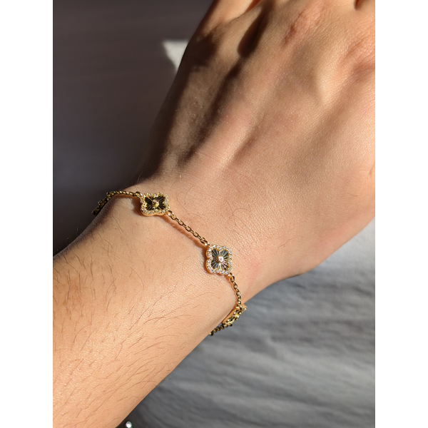 Diamond Cut Quatrefoil Bracelet in Sterling Silver and Yellow Gold Image 2 Conti Jewelers Endwell, NY