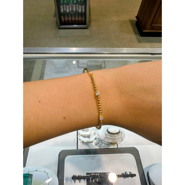 Three Cubic Zirconia Stone Bangle in Yellow Gold Image 2 Conti Jewelers Endwell, NY
